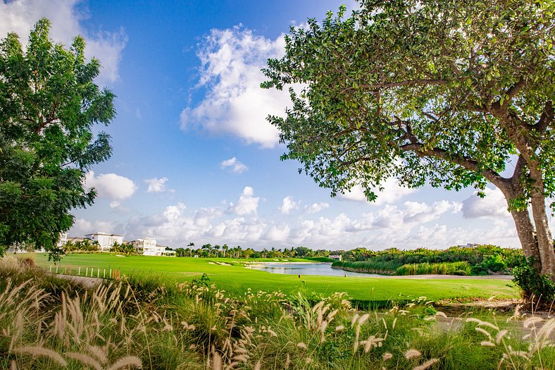 Lujo, playa, piscina y campo de golf en Cana Bay