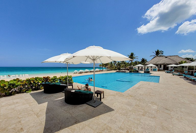 Lujo, playa, piscina y campo de golf en Cana Bay