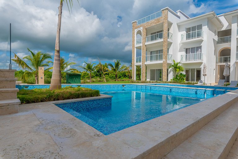 Lujo, playa, piscina y campo de golf en Cana Bay