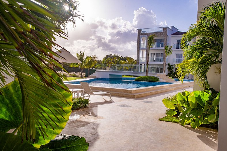 Lujo, playa, piscina y campo de golf en Cana Bay