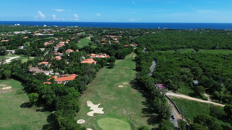 Villa con piscina y vista al campo de golf